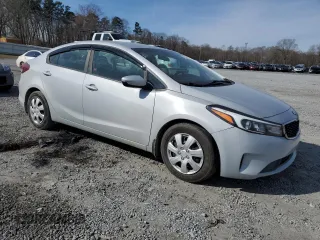 2017 Kia Forte LX with VIN 3KPFK4A70HE159546, listed as a Copart auction lot 45941055 with 122,962 mi miles and Salvage Title. Bid and sale history available at carsss.com. Image 4.