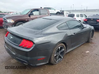2018 Ford Mustang EcoBoost z VIN 1FA6P8TH2J5184485, wystawiony jako IAAI lot #41884810 z przebiegiem 74 999 mil mil oraz . Historia ofert i sprzedaży dostępna na DreamBid. Obrazek 4.