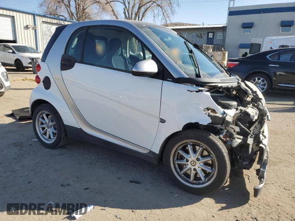 2010 Smart fortwo Pure with VIN WMEEJ3BA4AK341838, listed as a Copart auction lot 42514165 with 86,418 mi miles and Salvage title. Bid and sale history available at DreamBid. Image 4.