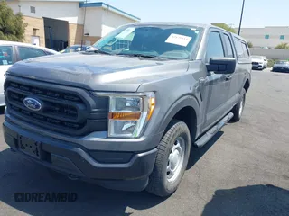 2022 Ford F-150 XL z VIN 1FTEX1EP3NKE22465, wystawiony jako IAAI lot #42179153 z przebiegiem 26 500 mil mil oraz . Historia ofert i sprzedaży dostępna na DreamBid. Obrazek 21.