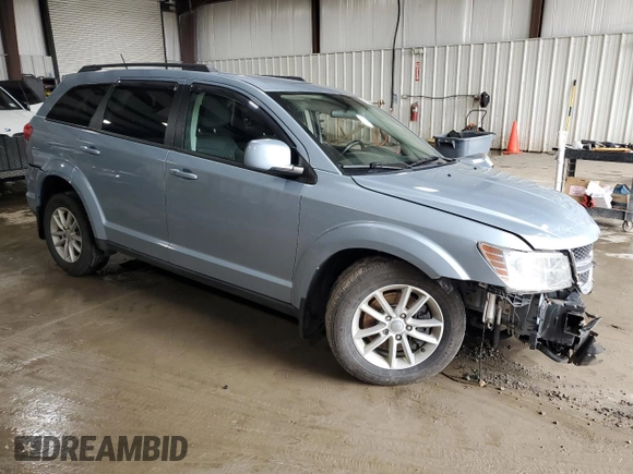 2013 Dodge Journey SXT with VIN 3C4PDDBG8DT579154, listed as a Copart auction lot 51261135 with 96,230 mi miles and Salvage Title. Bid and sale history available at DreamBid. Image 4.
