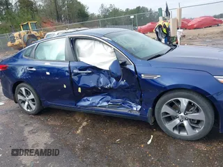 2019 Kia Optima LX with VIN 5XXGT4L37KG361486, listed as a IAAI auction lot 41601404 with 56,891 mi miles. Bid and sale history available at carsss.com. Image 6.