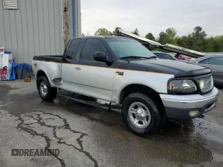 1999 Ford F-150 z VIN 2FTRX08WXXCA60270, wystawiony jako Copart lot #51913935 z przebiegiem Nie podano mil oraz Szkoda całkowita • Salvage title. Historia ofert i sprzedaży dostępna na DreamBid. Obrazek 4.
