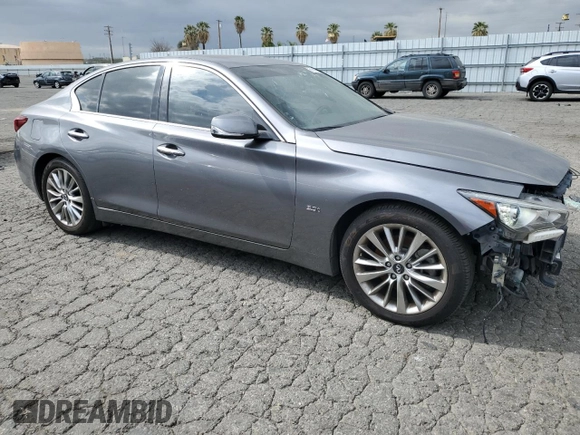 2019 Infiniti Q50 Luxe z VIN JN1EV7AP6KM513800, wystawiony jako Copart lot #51117555 z przebiegiem 92 337 mil mil oraz Szkody całkowita. Historia ofert i sprzedaży dostępna na DreamBid. Obrazek 4.