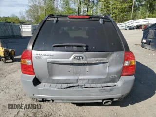 2007 Kia Sportage LX z VIN KNDJE723X77430674, wystawiony jako Copart lot #57050615 z przebiegiem 136 731 mil mil oraz Szkoda całkowita • Salvage title. Historia ofert i sprzedaży dostępna na DreamBid. Obrazek 6.