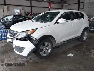 2013 Kia Sportage LX z VIN KNDPBCA28D7356137, wystawiony jako IAAI lot #41577243 z przebiegiem 141 985 mil mil oraz . Historia ofert i sprzedaży dostępna na DreamBid. Obrazek 16.