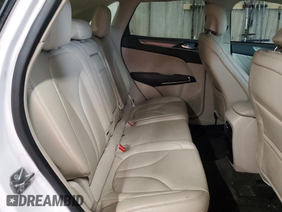 2017 Lincoln MKC Premiere z VIN 5LMCJ1D91HUL51490, wystawiony jako Copart lot #58367225 z przebiegiem 94 861 mil mil oraz Szkoda całkowita • Salvage title. Historia ofert i sprzedaży dostępna na DreamBid. Obrazek 11.