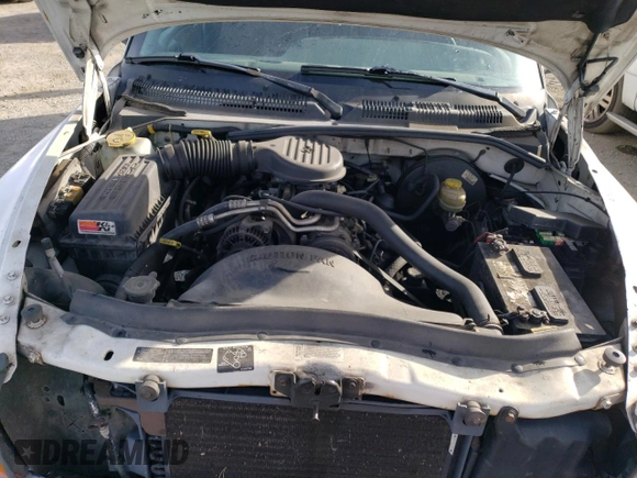 1997 Dodge Dakota z VIN 1B7GL23X0VS124517, wystawiony jako Copart lot #82896894 z przebiegiem 227 782 mil mil oraz Szkoda całkowita • Salvage title. Historia ofert i sprzedaży dostępna na DreamBid. Obrazek 11.