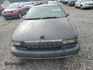 1992 Chevrolet Caprice z VIN 1G1BN53E5NW120694, wystawiony jako Copart lot #73438584 z przebiegiem 156 839 mil mil oraz Czysty tytuł • Clean title. Historia ofert i sprzedaży dostępna na DreamBid. Obrazek 5.
