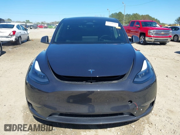 2024 Tesla Model Y Long Range z VIN 7SAYGDEE8RA262082, wystawiony jako IAAI lot #41834216 z przebiegiem 11 536 mil mil oraz . Historia ofert i sprzedaży dostępna na DreamBid. Obrazek 13.