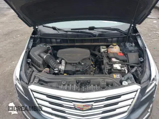 2019 Cadillac XT5 FWD with VIN 1GYKNARS5KZ220134, listed as a IAAI auction lot 41472927 with 58,229 mi miles and . Bid and sale history available at DreamBid. Image 10.