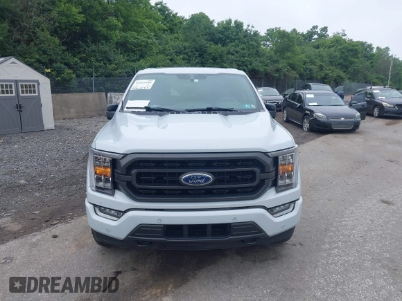 2021 Ford F-150 XL z VIN 1FTEW1EP5MKE17091, wystawiony jako IAAI lot #42413293 z przebiegiem 57 042 mil mil oraz . Historia ofert i sprzedaży dostępna na DreamBid. Obrazek 13.