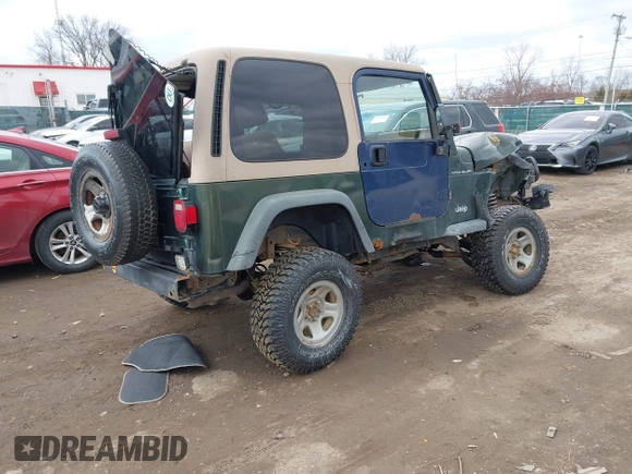 1997 Jeep Wrangler SE with VIN 1J4FY29PXVP406939, listed as a IAAI auction lot 41612380 with 248,314 mi miles. Bid and sale history available at carsss.com. Image 4.