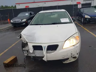 2006 Pontiac G6 6-Cyl z VIN 1G2ZG558364172091, wystawiony jako IAAI lot #42377332 z przebiegiem 199 495 mil mil oraz . Historia ofert i sprzedaży dostępna na DreamBid. Obrazek 12.