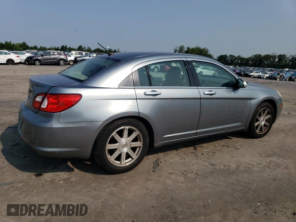 2008 Chrysler Sebring Limited with VIN 1C3LC66M08N277459, listed as a Copart auction lot 60237525 with 122,590 mi miles and Salvage title. Bid and sale history available at DreamBid. Image 3.