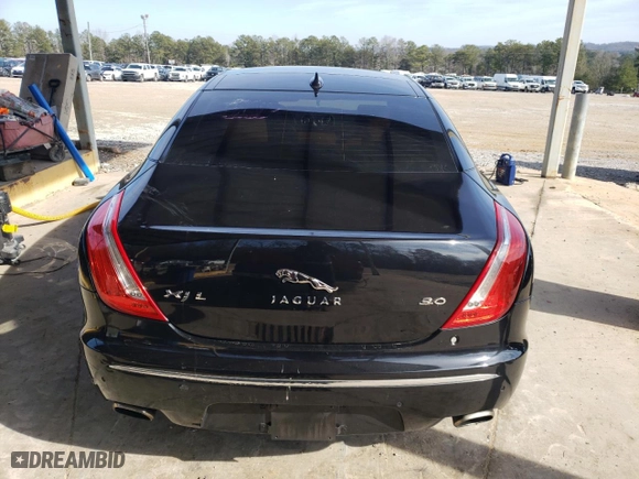 2015 Jaguar XJ with VIN SAJWA2GZ1F8V85688, listed as a Copart auction lot 43112915 with 0 mi miles and Salvage Title. Bid and sale history available at carsss.com. Image 6.