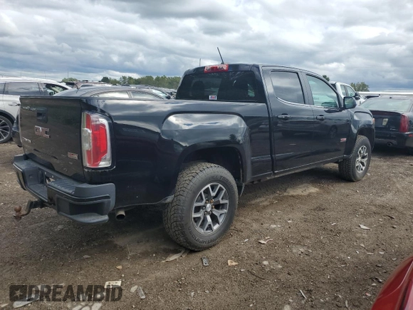 2015 GMC Canyon 4WD SLE with VIN 1GTG6BE33F1117408, listed as a Copart auction lot 68904364 with 258,676 mi miles and Clean Title. Bid and sale history available at carsss.com. Image 3.