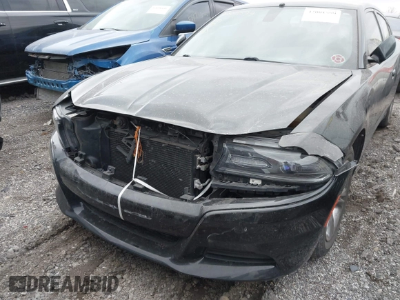 2015 Dodge Charger SE with VIN 2C3CDXBG7FH841469, listed as a IAAI auction lot 42001599 with 103,342 mi miles and . Bid and sale history available at DreamBid. Image 6.