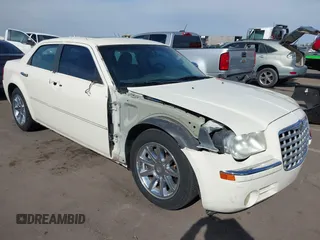 2006 Chrysler 300 C with VIN 2C3KA63H06H534666, listed as a IAAI auction lot 41892603 with 116,431 mi miles. Bid and sale history available at carsss.com. Image 6.