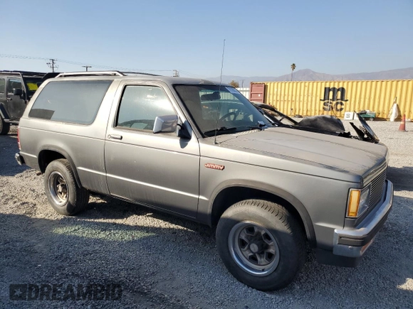 1988 GMC Jimmy z VIN 1GKCS18Z2J8541042, wystawiony jako Copart lot #78100004 z przebiegiem 199 916 mil mil oraz Czysty tytuł • Clean title. Historia ofert i sprzedaży dostępna na DreamBid. Obrazek 4.
