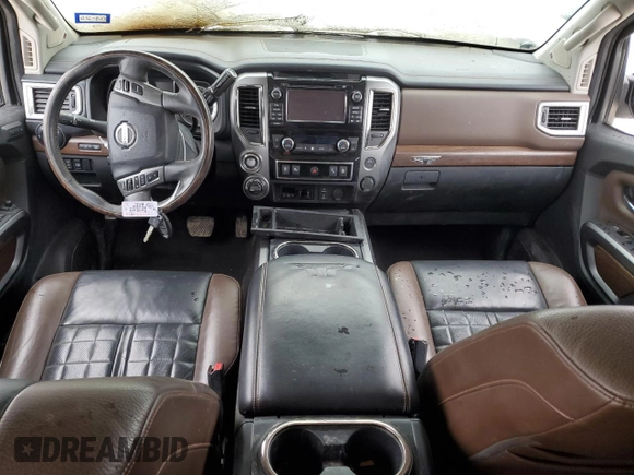 2017 Nissan Titan Platinum Reserve z VIN 1N6AA1E56HN542534, wystawiony jako Copart lot #44550645 z przebiegiem Nie podano mil oraz Szkoda całkowita • Salvage title. Historia ofert i sprzedaży dostępna na DreamBid. Obrazek 8.
