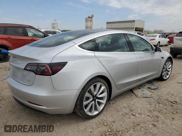 2018 Tesla Model 3 Long Range Battery with VIN 5YJ3E1EB5JF087606, listed as a Copart auction lot 52298485 with 73,242 mi miles and Salvage Title. Bid and sale history available at DreamBid. Image 3.
