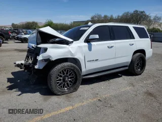 2018 Chevrolet Tahoe LS with VIN 1GNSCAKC0JR296669, listed as a Copart auction lot 54044745 with 147,457 mi miles and Salvage title. Bid and sale history available at DreamBid. Image 1.