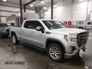 2022 GMC Sierra 1500 SLT z VIN 3GTU9DED6NG157903, wystawiony jako IAAI lot #42119114 z przebiegiem 88 954 mil mil oraz . Historia ofert i sprzedaży dostępna na DreamBid. Obrazek 1.