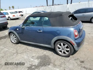 2010 MINI Convertible with VIN WMWMR3C51ATU97217, listed as a Copart auction lot 67732714 with 127,880 mi miles and Clean Title. Bid and sale history available at DreamBid. Image 2.