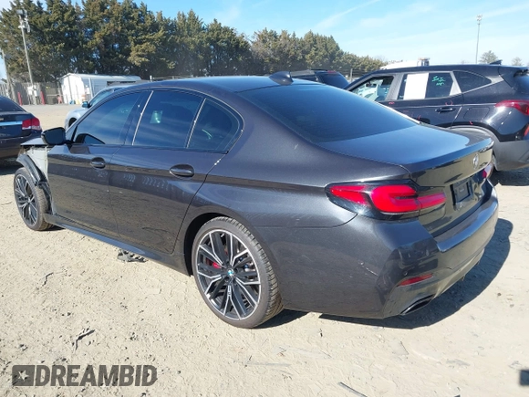 2021 BMW 5 Series 540i xDrive with VIN WBA73BJ0XMWX01449, listed as a IAAI auction lot 41630703 with 65,212 mi miles and . Bid and sale history available at DreamBid. Image 3.