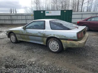 1988 Toyota Supra with VIN JT2MA70J7J0097790, listed as a Copart auction lot 50250145 with 131,411 mi miles and Clean title. Bid and sale history available at DreamBid. Image 2.