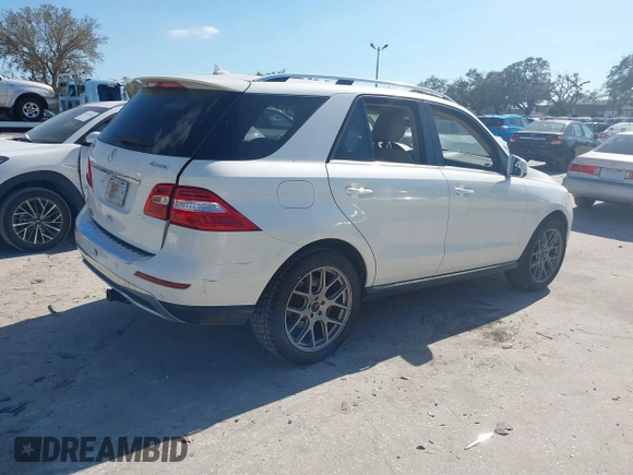 2014 Mercedes-Benz M 350 with VIN 4JGDA5HBXEA373643, listed as a IAAI auction lot 41554130 with 121,995 mi miles and . Bid and sale history available at DreamBid. Image 4.
