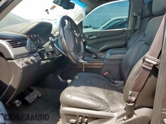 2015 Chevrolet Tahoe LT with VIN 1GNSKBKC1FR139281, listed as a Copart auction lot 57583595 with 142,090 mi miles and Salvage title. Bid and sale history available at DreamBid. Image 7.