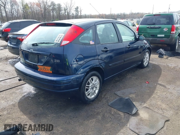 2004 Ford Focus ZX5 z VIN 3FAFP37334R120359, wystawiony jako IAAI lot #41922026 z przebiegiem 115 789 mil mil oraz . Historia ofert i sprzedaży dostępna na DreamBid. Obrazek 4.
