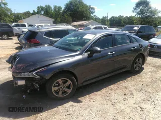 2021 Kia K5 LXS z VIN 5XXG14J25MG017125, wystawiony jako IAAI lot #42177700 z przebiegiem 55 855 mil mil oraz . Historia ofert i sprzedaży dostępna na DreamBid. Obrazek 2.