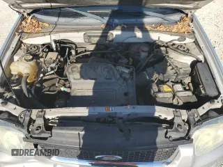 2004 Ford Escape Limited with VIN 1FMCU041X4KA45604, listed as a Copart auction lot 80974334 with 88,687 mi miles and Salvage title. Bid and sale history available at DreamBid. Image 14.