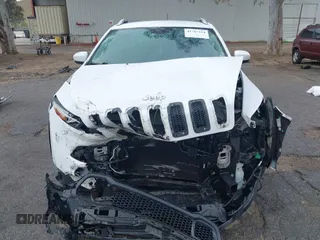 2015 Jeep Cherokee Latitude with VIN 1C4PJMCB1FW751758, listed as a IAAI auction lot 41767154 with 160,349 mi miles. Bid and sale history available at carsss.com. Image 12.