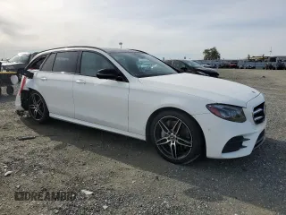 2019 Mercedes-Benz E 450 with VIN WDDZH6JB6KA671808, listed as a Copart auction lot 49857245 with 99,709 mi miles and Salvage Title. Bid and sale history available at DreamBid. Image 4.