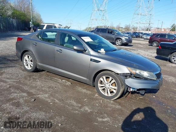 2013 Kia Optima EX with VIN 5XXGN4A71DG158712, listed as a IAAI auction lot 41965166 with 126,943 mi miles. Bid and sale history available at carsss.com. Image 1.