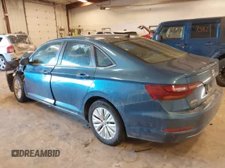 2019 Volkswagen Jetta S z VIN 3VWCB7BU9KM194136, wystawiony jako IAAI lot #41463927 z przebiegiem 103 847 mil mil oraz . Historia ofert i sprzedaży dostępna na DreamBid. Obrazek 3.