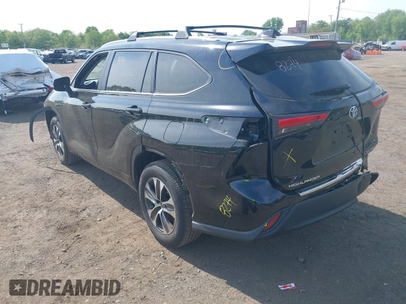 2023 Toyota Highlander L with VIN 5TDKDRBHXPS030361, listed as a IAAI auction lot 42230419 with 59,404 mi miles and . Bid and sale history available at DreamBid. Image 3.
