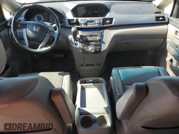 2011 Honda Odyssey Touring с VIN 5FNRL5H94BB078137, выставлен на аукционе Copart как лот 57467505 с пробегом 210 405 миль миль и Списание • Salvage title. История ставок и продаж доступна на DreamBid. Изображение 8.