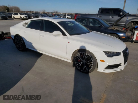 2016 Audi A7 3.0 Prestige with VIN WAU2GAFC8GN005520, listed as a Copart auction lot 42565444 with 102,805 mi miles. Bid and sale history available at carsss.com. Image 4.