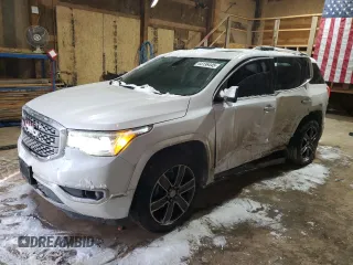 2017 GMC Acadia Denali with VIN 1GKKNXLSXHZ220841, listed as a Copart auction lot 44136445 with 126,068 mi miles and Salvage Title. Bid and sale history available at carsss.com. Image 1.
