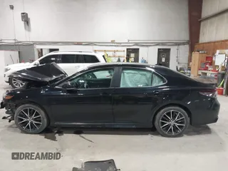 2021 Toyota Camry SE Nightshade with VIN 4T1T11AK2MU483971, listed as a IAAI auction lot 41934957 with 61,618 mi miles and . Bid and sale history available at DreamBid. Image 14.