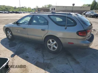 2004 Ford Taurus SE with VIN 1FAFP58S44A108250, listed as a Copart auction lot 58520615 with 119,575 mi miles and Salvage title. Bid and sale history available at DreamBid. Image 2.