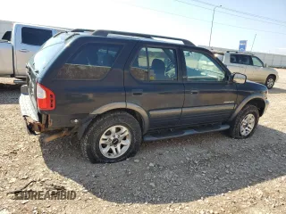 2003 Isuzu Rodeo with VIN 4S2CK58W634313617, listed as a Copart auction lot 70144664 with 179,921 mi miles and Clean Title. Bid and sale history available at DreamBid. Image 3.