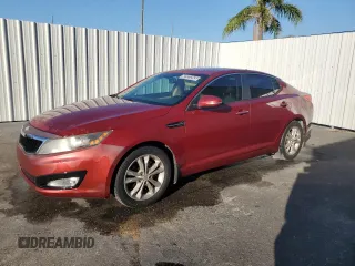 2013 Kia Optima EX z VIN 5XXGN4A79DG253714, wystawiony jako Copart lot #62323245 z przebiegiem 123 315 mil mil oraz Czysty tytuł • Clean title. Historia ofert i sprzedaży dostępna na DreamBid. Obrazek 1.