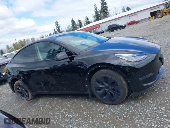 2024 Tesla Model Y with VIN 7SAYGDED3RF119101, listed as a IAAI auction lot 42019817 with 35,714 mi miles and . Bid and sale history available at DreamBid. Image 13.