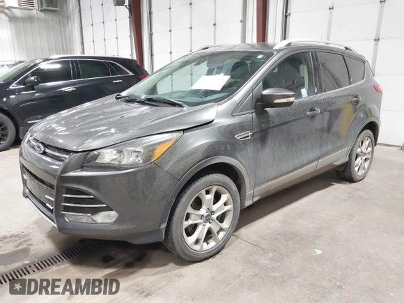 2016 Ford Escape Titanium with VIN 1FMCU9J93GUC39933, listed as a IAAI auction lot 42616323 with 116,482 mi miles and . Bid and sale history available at DreamBid. Image 18.